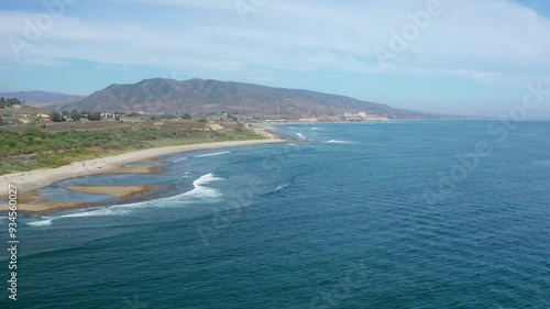 Descending and approaching group of surfers at Trestles in San Clemente, CA