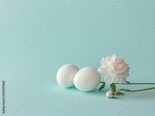 Minimalist Composition of Three White Eggs and a Flower, Easter concept