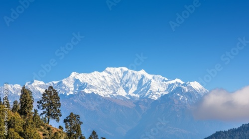 Wallpaper Mural Majestic mountain range with snow-capped peaks and clear blue sky above. Majestic Mountain Range Torontodigital.ca
