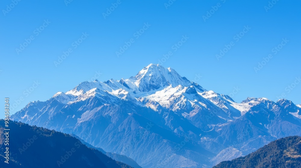 Majestic mountain range with snow-capped peaks and clear blue sky above. Majestic Mountain Range Majestic mountain range with snow-capped peaks and clear blue sky above. Majestic Mountain Range