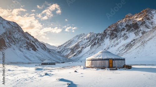 A traditional yurt camp in a snow-covered valley, framed by the highlands, offering a peaceful winter retreat for tourists.