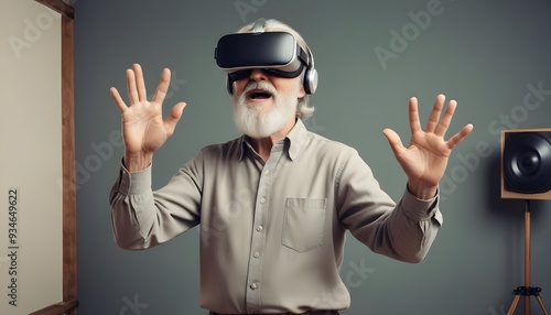 Elderly man using VR virtual reality headset in studio portrait white background