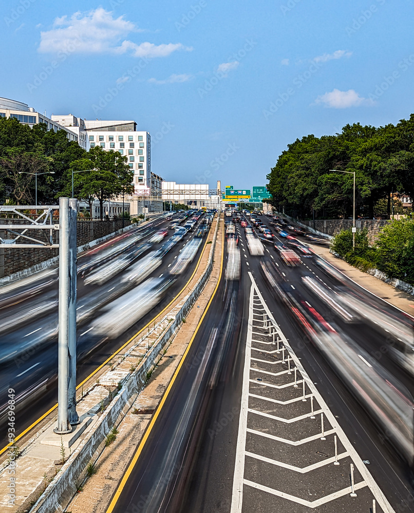 Cars driving down the highway with motion blur effect through rush hour traffic in Washington DC