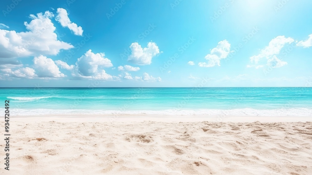 Obraz premium Closeup of sandy beach with turquoise sea and sky background