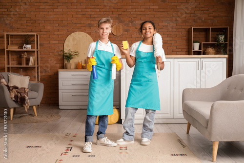 Teenage janitors with clean...