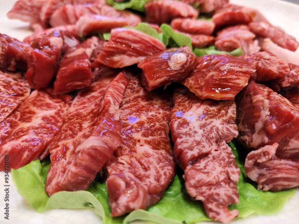 Premium Japanese wagyu beef sliced on plate for bbq Premium Japanese wagyu beef sliced on plate for bbq