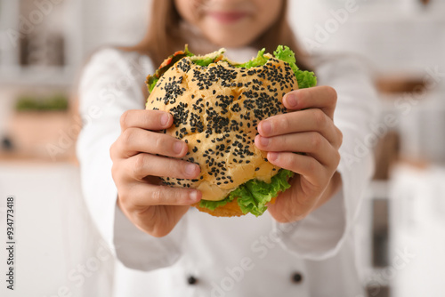 Cute little happy chef with...