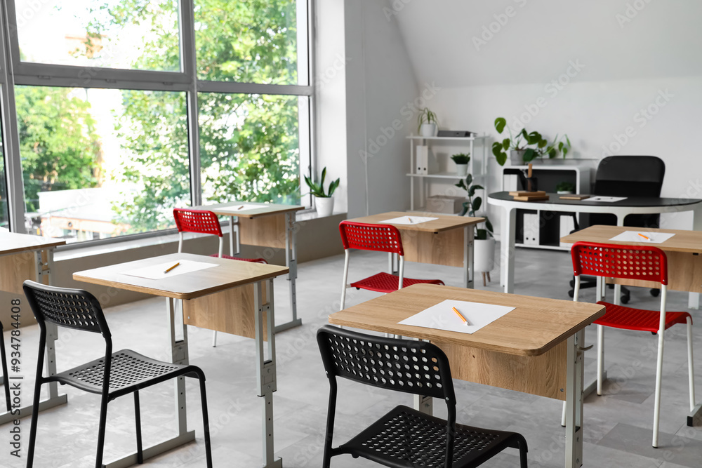 Interior of classroom prepared for exam Interior of classroom prepared for exam
