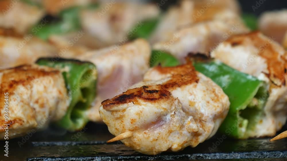 Delicious Grilled Chicken Skewers with Fresh Green Peppers Cooked on the BBQ Grill Delicious Grilled Chicken Skewers with Fresh Green Peppers Cooked on the BBQ Grill