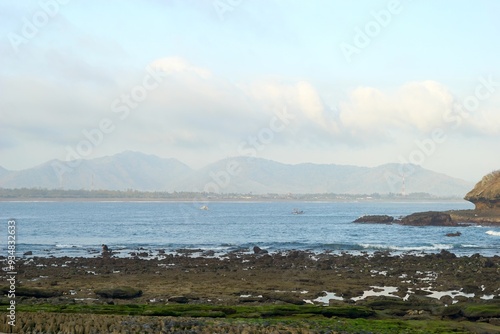 The beautiful panorama of Papuma Beach or Malikan White Sand in Jember photo