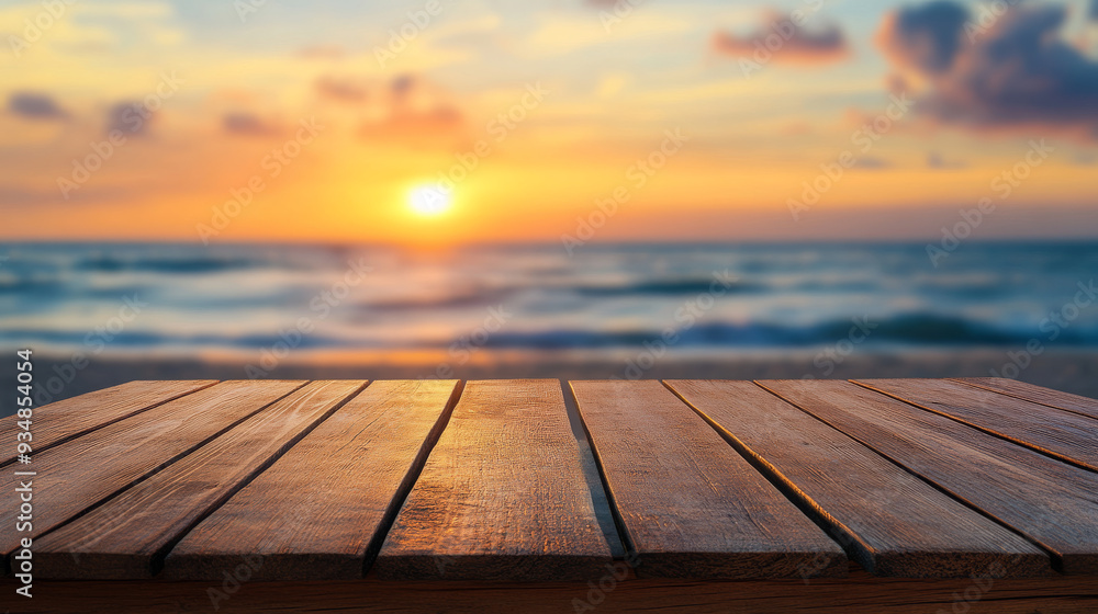An empty wooden table is set against a blurred sunset beach background, providing a perfect setting for showcasing products. The scene highlights the table's surface, while the soft hues of the sunset An empty wooden table is set against a blurred sunset beach background, providing a perfect setting for showcasing products. The scene highlights the table's surface, while the soft hues of the sunset