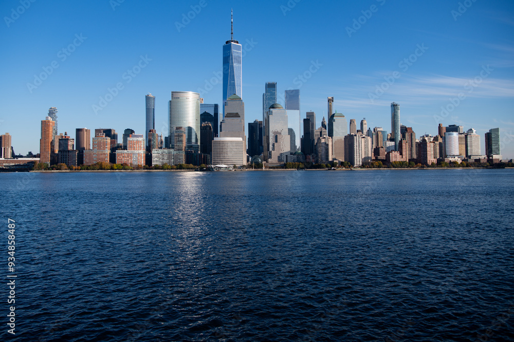 Obraz premium New York City skyline, cityscape of Manhattan in USA. New York City NYC Manhattan Downtown Skyline, viewed from Jersey City, New Jersey, USA.