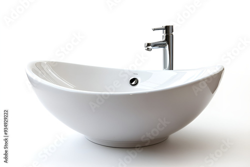 Modern white ceramic bathroom sink with sleek faucet. Perfect for contemporary home interiors, featuring a minimalist design.