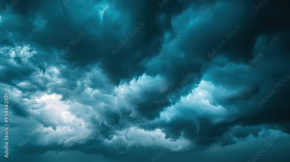 Obraz premium Dark, stormy clouds gathering during a rainy season, capturing the dramatic and intense weather