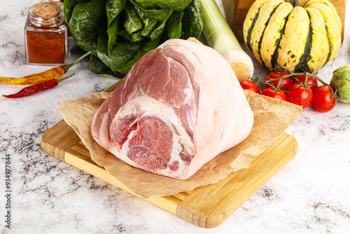 Photography Uncooked raw pork knuckle with spices