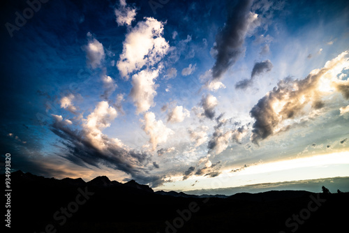 Dramatic Sunset Sky with Silhouetted Mountain Range