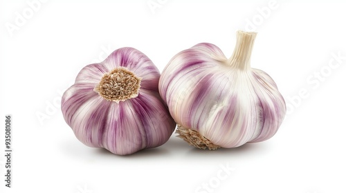 Two whole garlic bulbs with purple stripes, isolated on a white background.