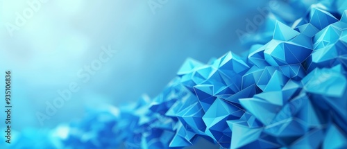  A tight shot of numerous blue origami-like forms against a blue backdrop, with a softly blurred sky in the distance photo