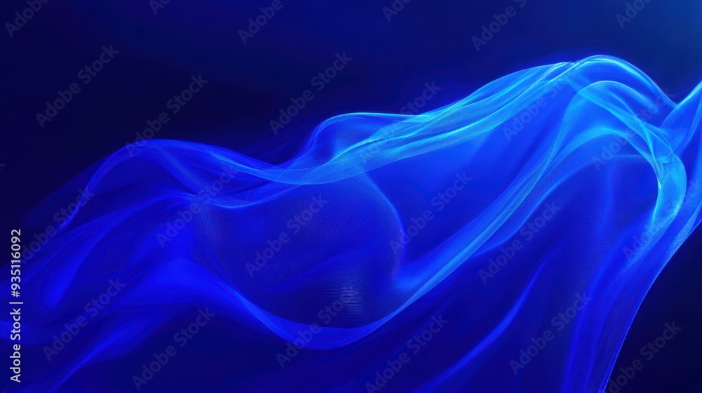 Fototapeta premium A flowing abstract design in shades of blue, evoking a sense of tranquility and motion.