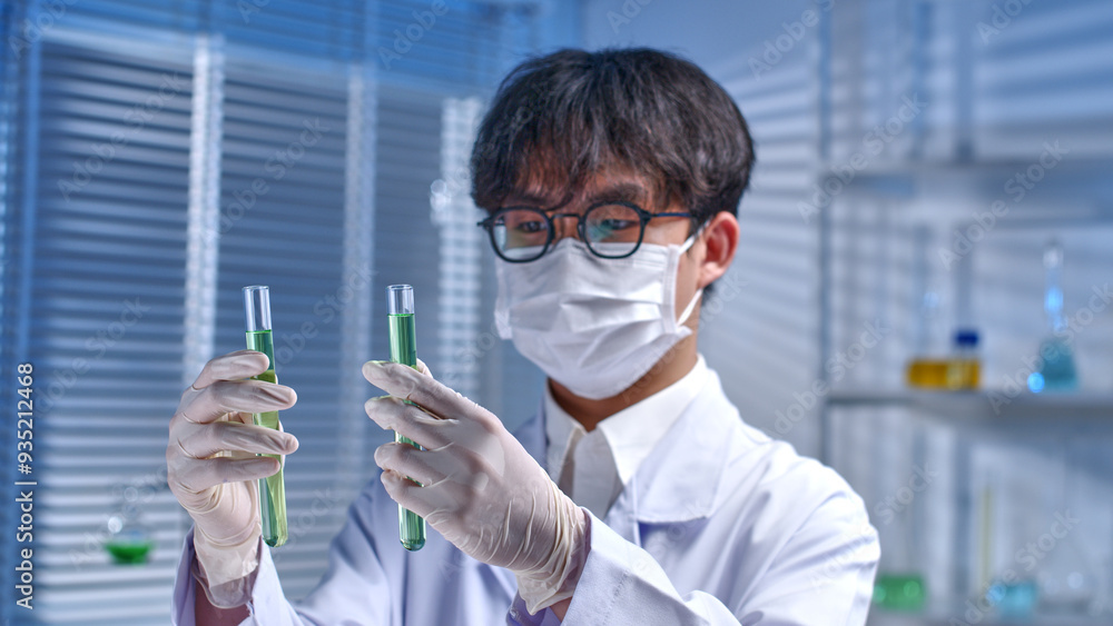 Laboratory theme photo was taken from side view, a young scientist ...