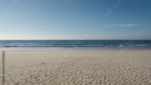 Landscape view of a beautiful beach with waves of water coming to shore, seaside view under daylight