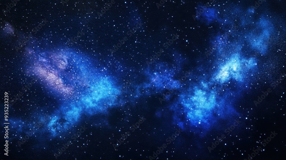 Fototapeta premium A stunning depiction of a starry galaxy with vibrant blue hues and scattered stars.