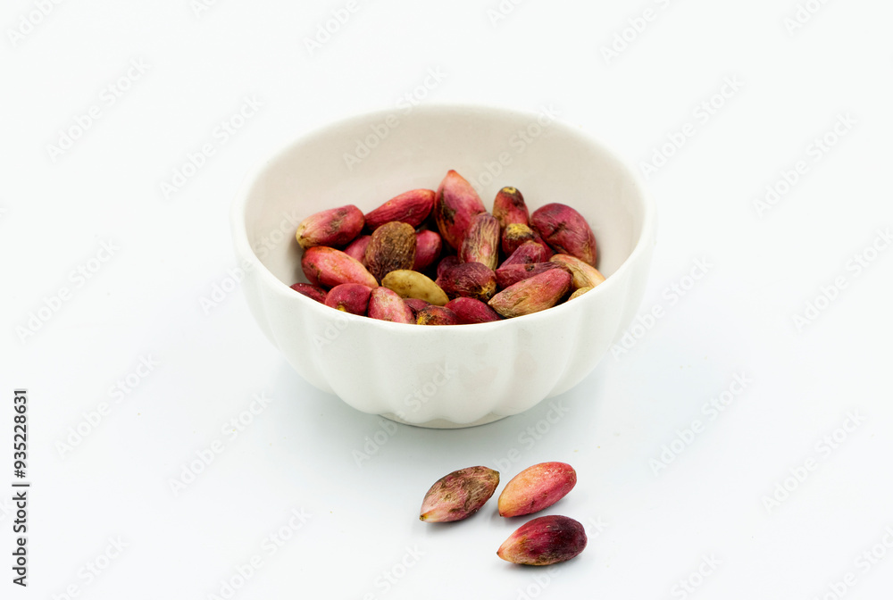 Fresh pistachios in shells to be eaten as a snack in a cup Fresh pistachios in shells to be eaten as a snack in a cup