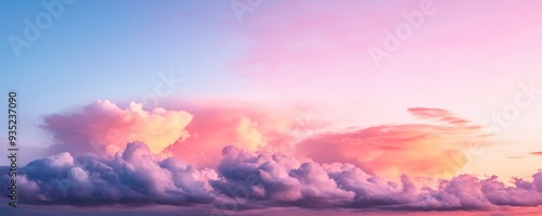 A muted sunset gradient background with soft cloud textures. 