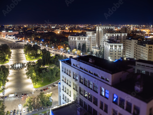 Aerial night panorama from Derzhprom building on Freedom Square and University in illuminated Kharkiv city, Ukraine photo