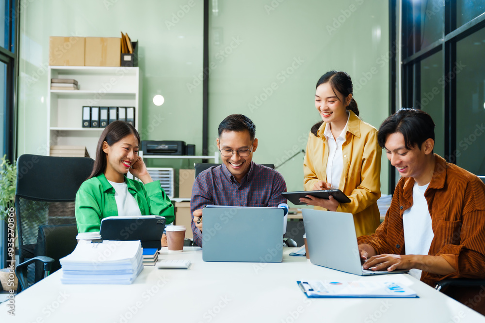 In a boardroom, an Asian team discusses startup financials and business terms. They present strategies on acquisitions, cash flow, and investor relations, innovative approaches for company growth. In a boardroom, an Asian team discusses startup financials and business terms. They present strategies on acquisitions, cash flow, and investor relations, innovative approaches for company growth.