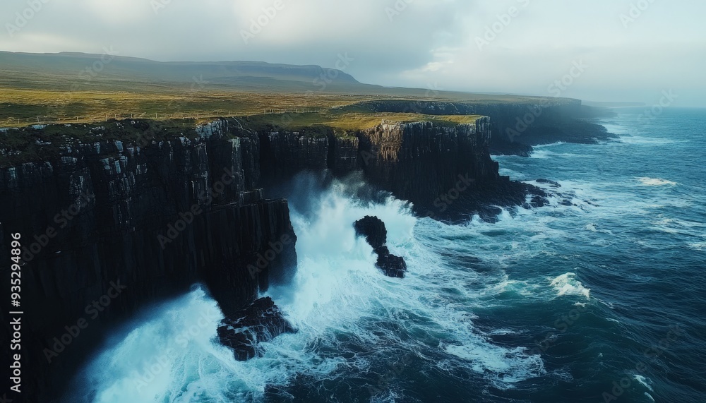 Aerial View of Rugged Coastline with Crashing Waves. Aerial View of Rugged Coastline with Crashing Waves.