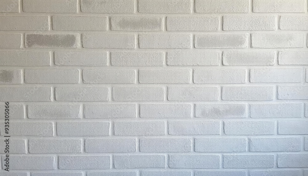 Naklejka premium Abstract weathered high resolution texture old stucco light gray and aged paint white brick wall background in rural room, grungy blocks of stonework technology color horizontal architecture , ai