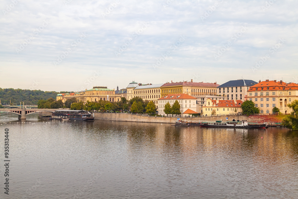 View of Jiraskuv Most and Vltava River. Panorama of embankment with historical buildings. Prague, Czech Republic. View of Jiraskuv Most and Vltava River. Panorama of embankment with historical buildings. Prague, Czech Republic.