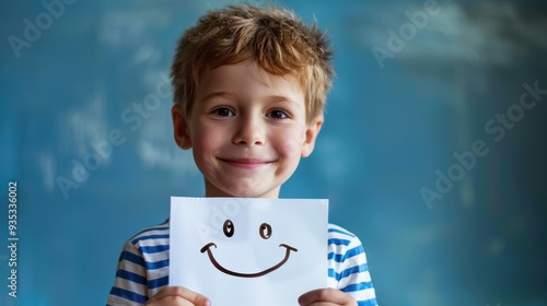 The boy with smiling card photo