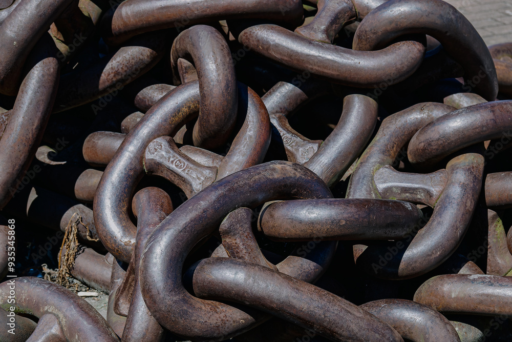 Close-up of heavy rusted metal chains intertwined. Close-up of heavy rusted metal chains intertwined.