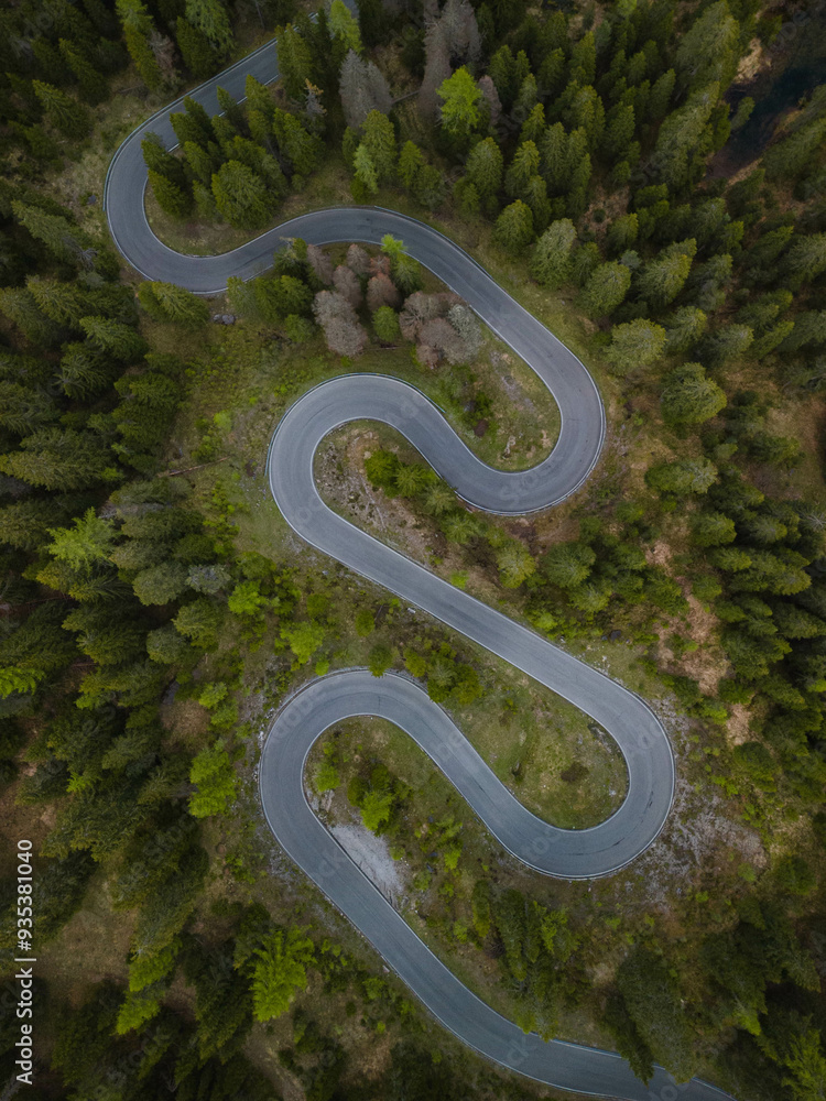 Snake road from a drone view in the Italian Alps, The Dolomites, Italy Snake road from a drone view in the Italian Alps, The Dolomites, Italy