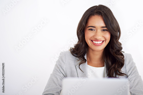 Portrait, business and woman with laptop, smile and finance clerk on white studio background. Face, happy person and employee with pc, online system and accounting report with admin for profit growth