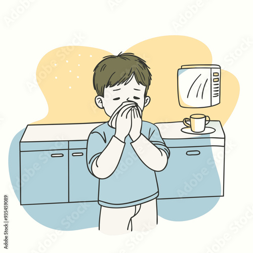 Sick boy suffering from cold or flu standing in kitchen and blowing his nose with a tissue