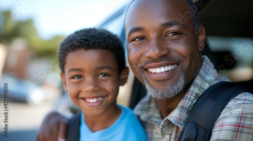 Happy father and son smiling