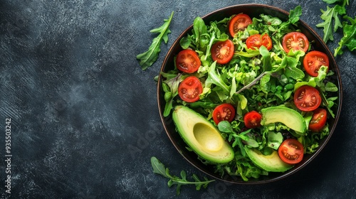 Fresh Green Salad with Avocado and Cherry Tomatoes.