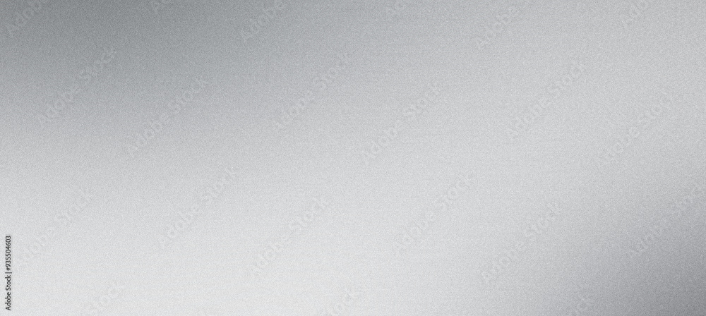 Smooth metallic gradient and subtle grainy texture in an abstract silver background Smooth metallic gradient and subtle grainy texture in an abstract silver background