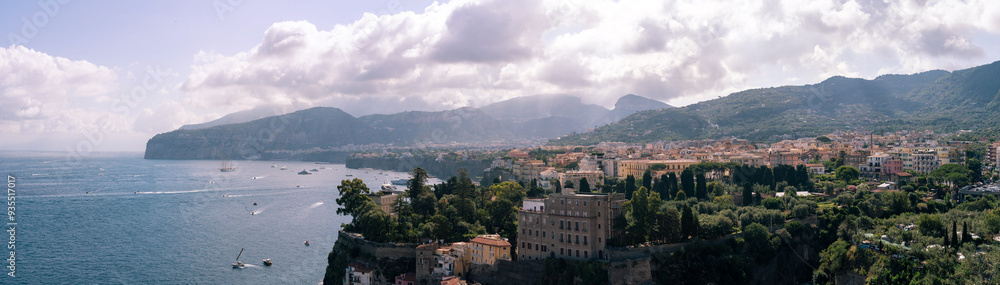 Panorama Scenic View of Sorrento Coastline and harbor against beautiful mountain landscape, Italy