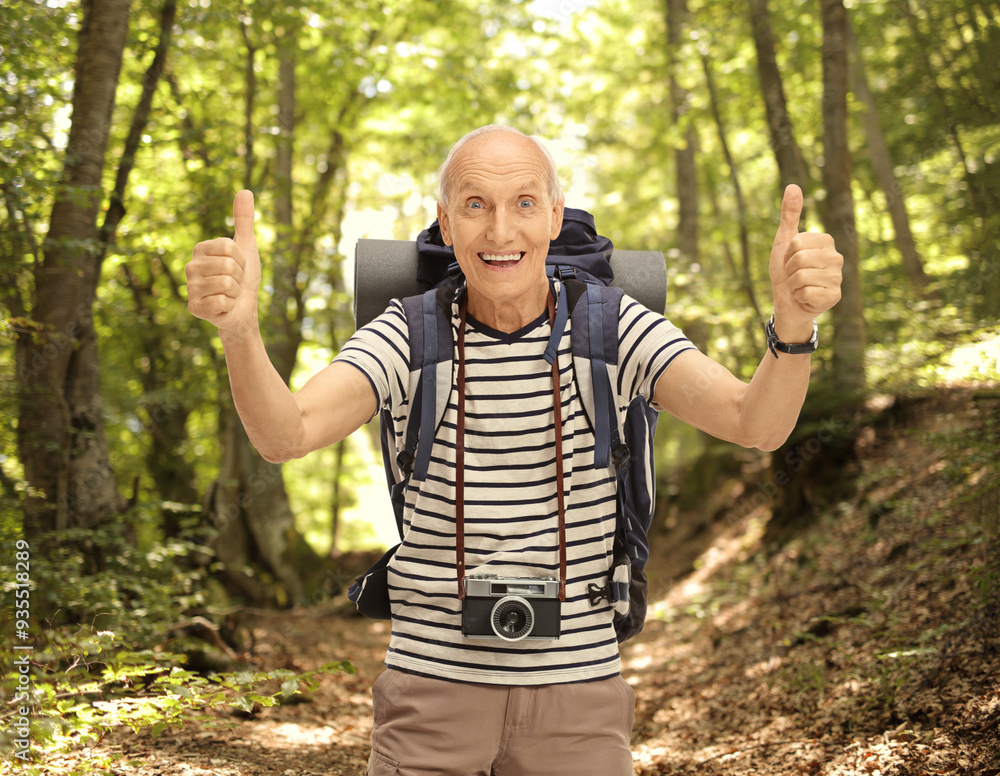 Happy elderly hiker giving two thumbs up Happy elderly hiker giving two thumbs up