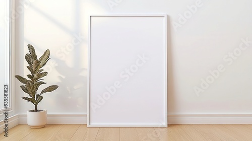 Wallpaper Mural White poster in a blank frame resting on a rustic wooden floor, ideal for showcasing your design ideas, offering ample free space for creative expressions. Torontodigital.ca