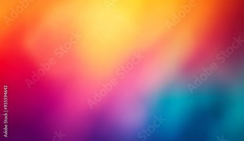 Abstract blurred background with a gradient of orange, red, pink, purple, and blue.