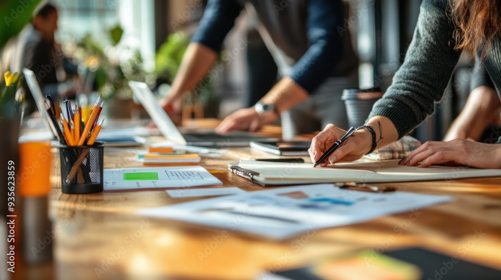 A focused office discussion where business professionals share insights and align on key initiatives. A focused office discussion where business professionals share insights and align on key initiatives.