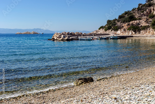 View of the sandy beach, the mountains and the sea (Greece, Salamis Island) photo