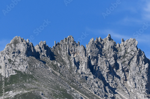 view of mountain ridges in summer with blue sky