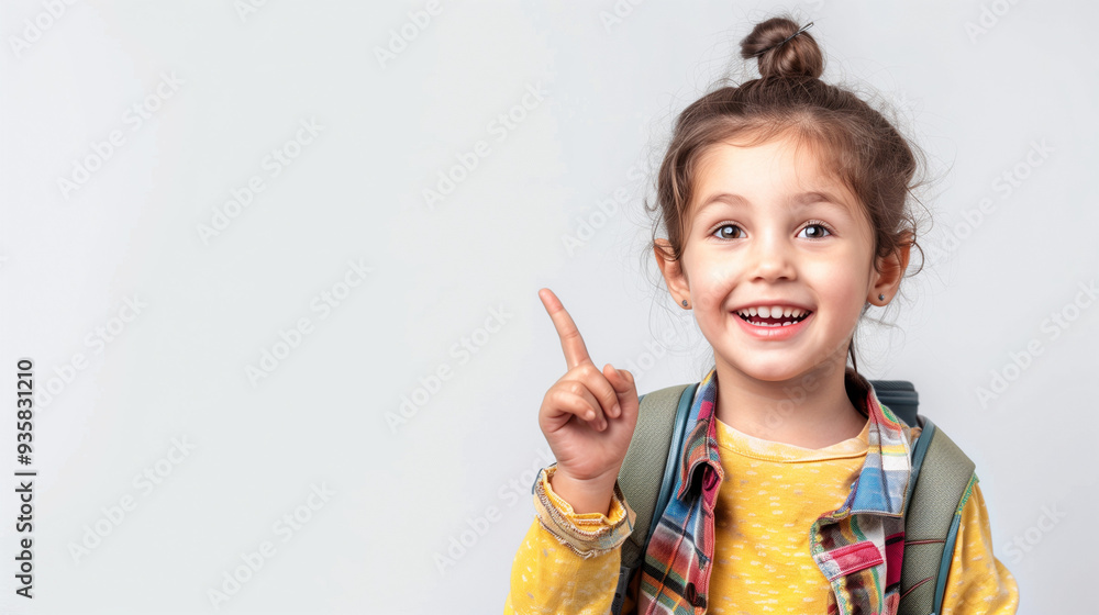 Little Girl with School Backpack Smiling with Hand Pointing at Something Little Girl with School Backpack Smiling with Hand Pointing at Something