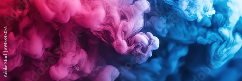 Banner with interweaving of colored smoke or paint in liquid. Bright abstract background. Orange-blue color. Around small drops of water or air bubbles. Blurred edges. Beautiful composition.